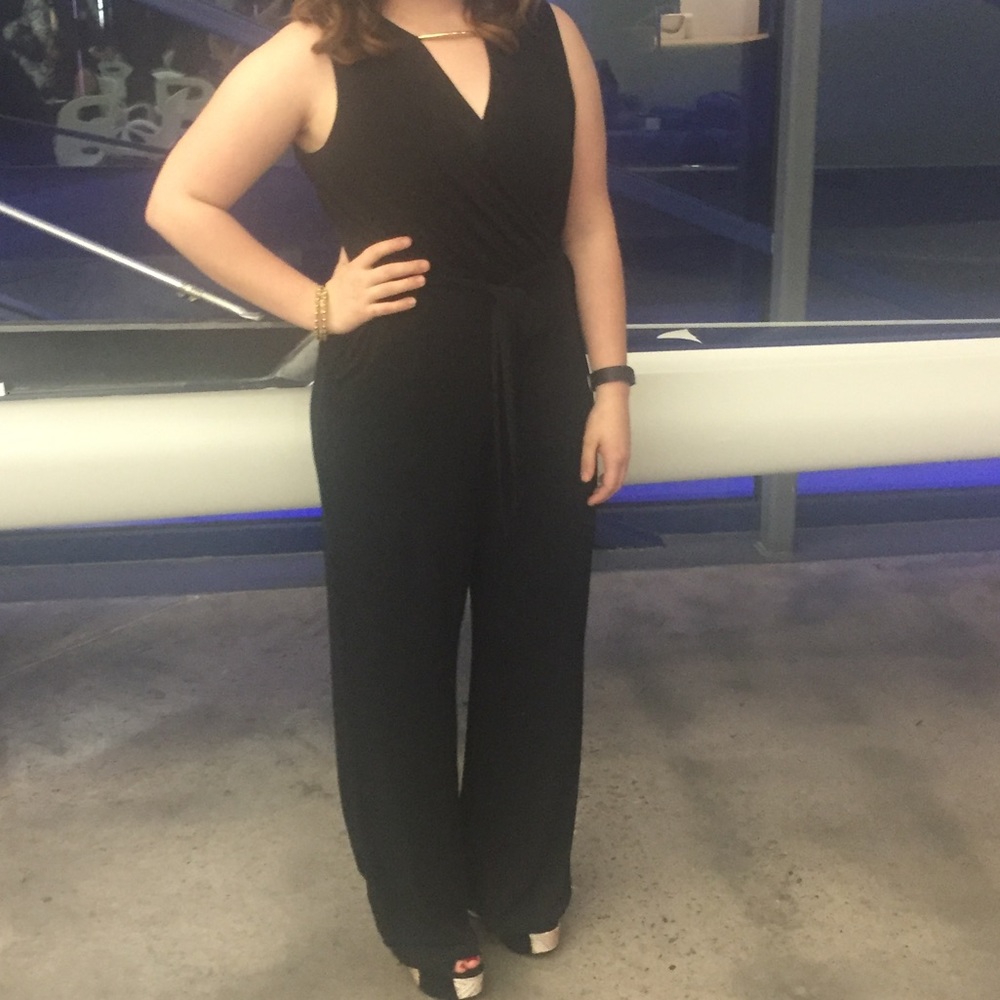 Black Calvin Klein jumpsuit w/ pockets